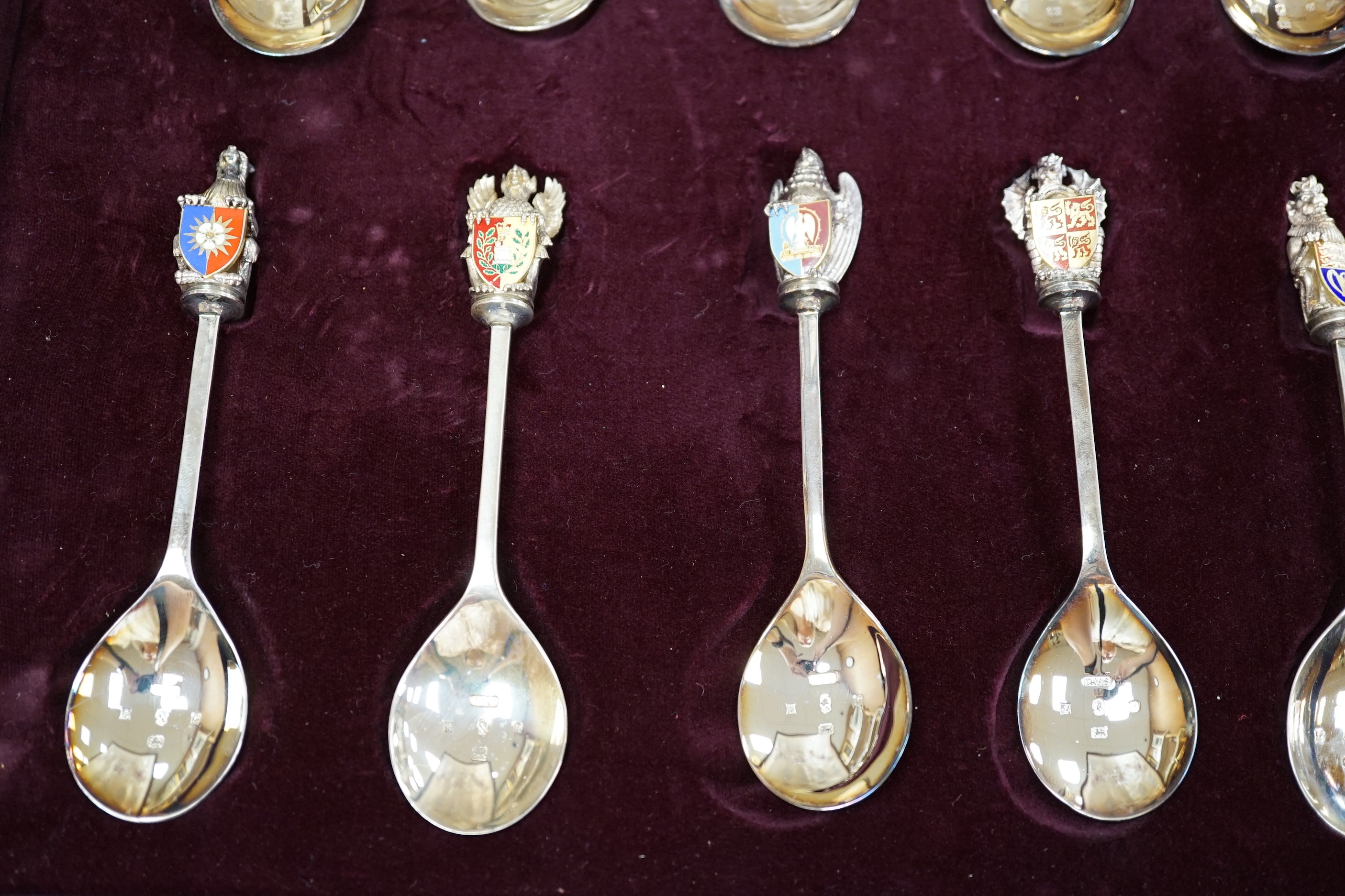 A modern limited edition cased set of ten silver and enamel 'The Queens Beasts Spoons', by Toye, Kenning & Spencer, no. 345/2500.